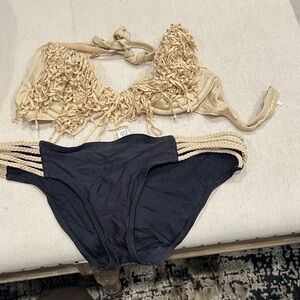 Luli Fama Tan and Black Bikini